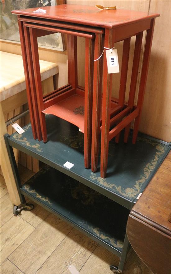 A nest of three red lacquered tea tables and a two tier black lacquered and gilt tea trolley tables W.47cm trolley W.76cm